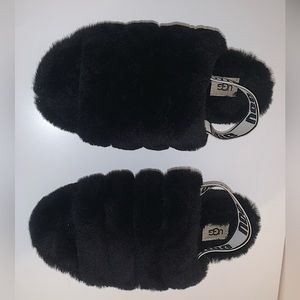 Fluffy black UGG slippers